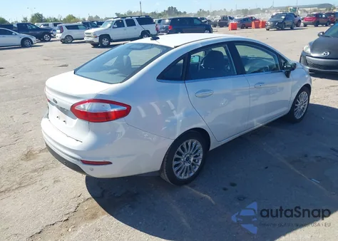 2014 Ford Fiesta Titanium z USA, uszkodzony, nr VIN 3FADP4CJ9EM134881